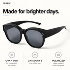 PETIT NORD black kids fit-over sunglasses, lens close-up