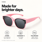 PETIT NORD pink kids fit-over sunglasses, lens close-up