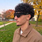 Man wearing RAFALE smoke fit-over shield sunglasses, side view