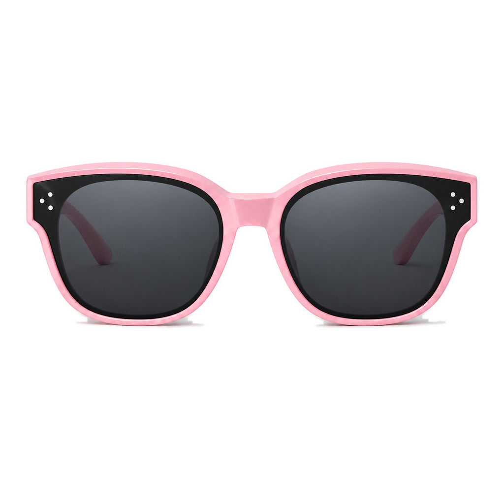 Lunettes de soleil enfant par-dessus PETIT NORD rose, vue de face
