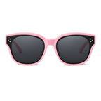 Lunettes de soleil enfant par-dessus PETIT NORD rose, vue de face
