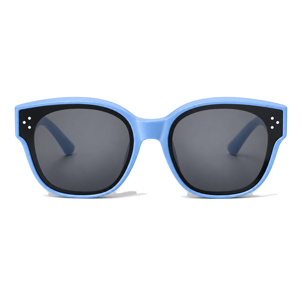 Lunettes de soleil enfant par-dessus PETIT NORD bleu ciel, vue de face